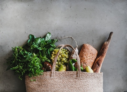 Flat lay of eco friendly bag with fresh foods  copy space