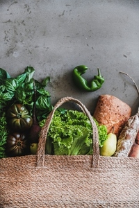 Flat lay of healthy grocery shopping bag with fresh ingredients