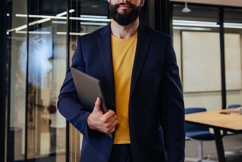 Professional businessman standing in an office