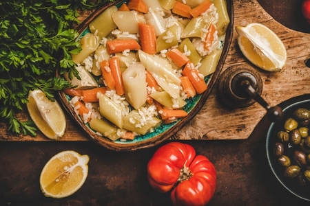 Turkish traditional leek  rice and carrot meze dish with lemon