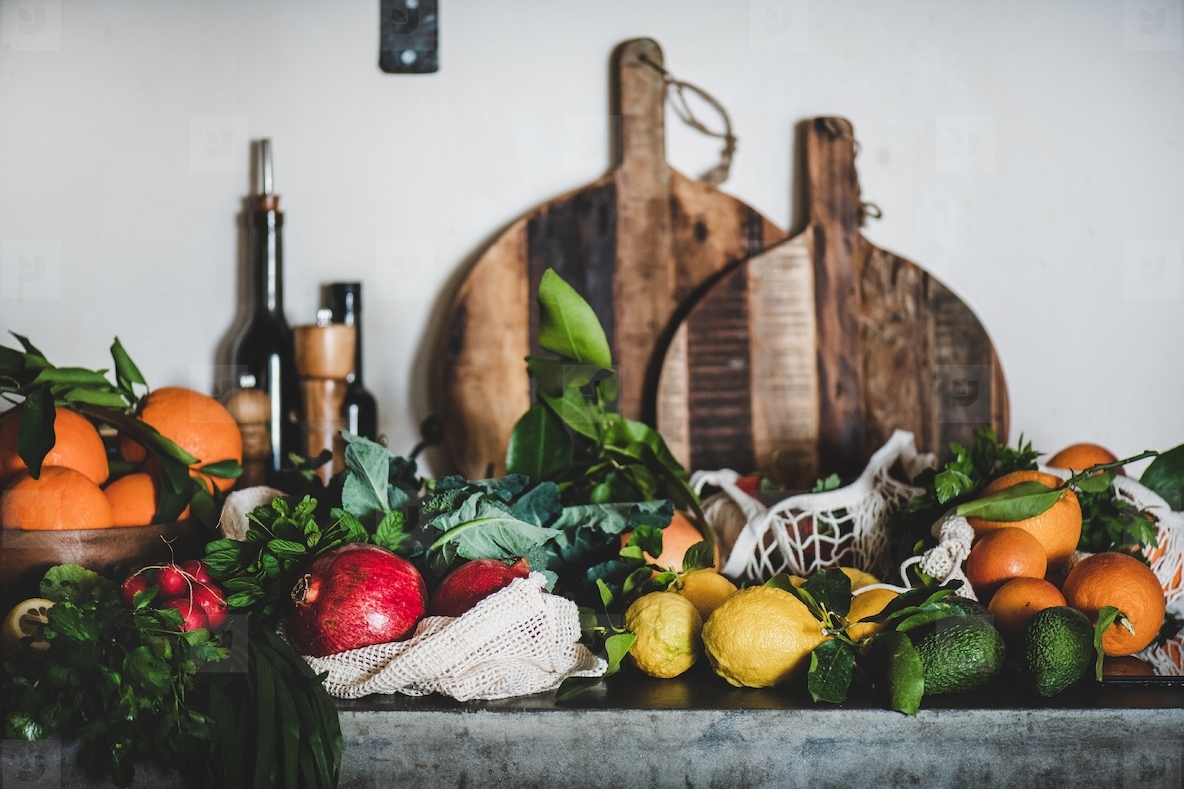 Assortment of vegan, vegetarian, balanced diet foods on kitchen counter