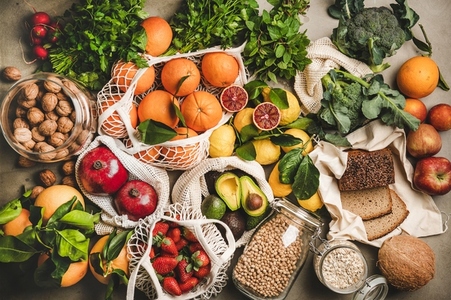 Assortment of vegan  vegetarian  balanced diet foods over grey background