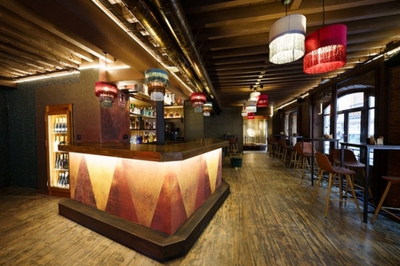 Interior of cafe with wooden bar counter