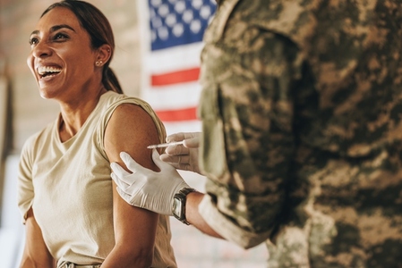 American servicewoman getting vaccinated in the military hospital
