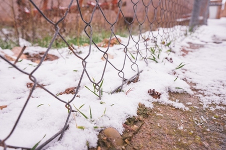 Abstract background of a snowy fence