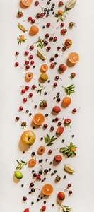 Flat lay of various summer fruits and berries  vertical composition