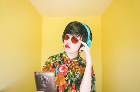 Cool young androgynous dj woman