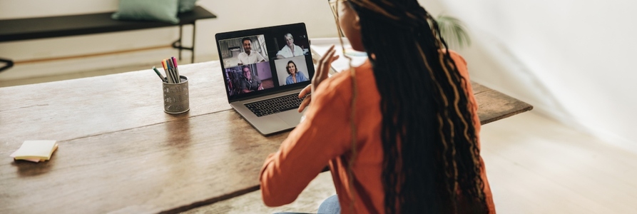 Freelancer attending a virtual meeting with her clients