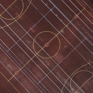 Aerial view lines and circles on red sports track