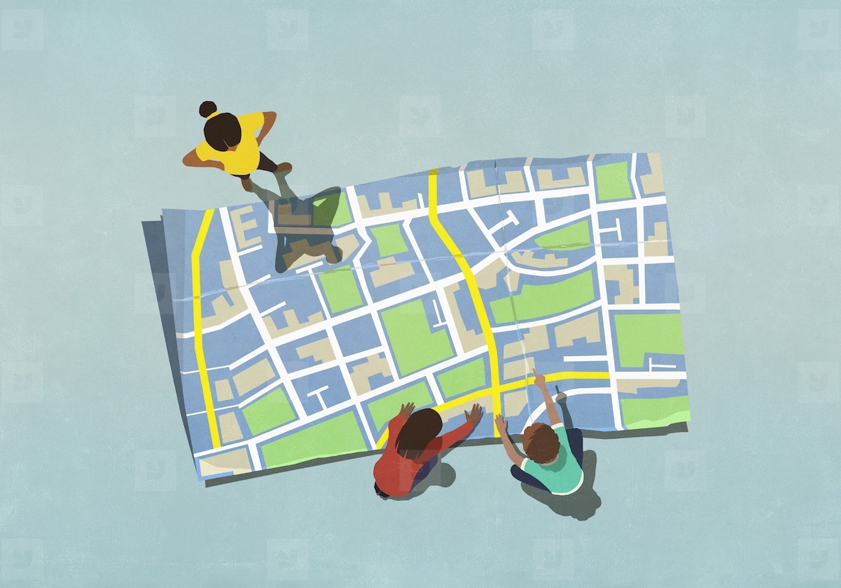 View from above kids looking at large map