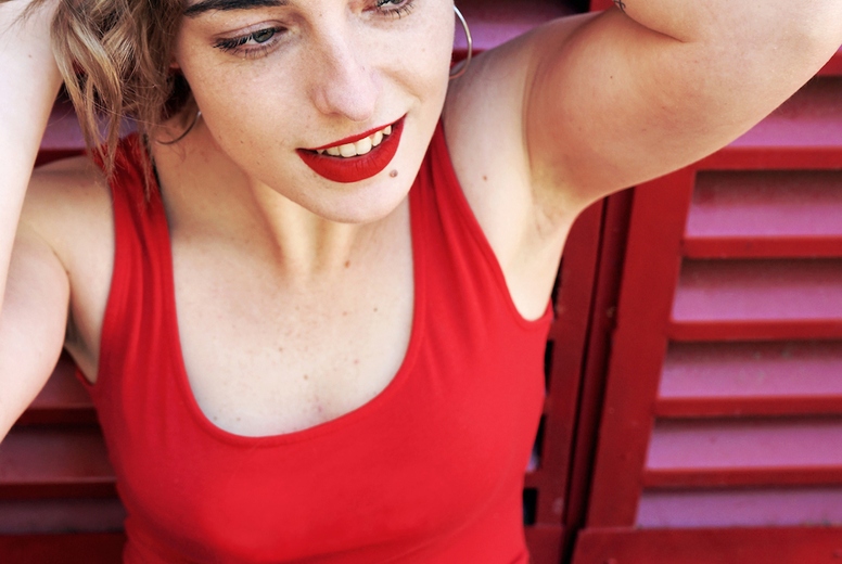 Beautiful young woman in red