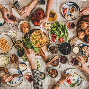 Flat lay of family having traditional Turkish breakfast  square crop