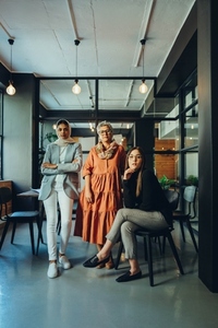 Diverse businesswomen looking at the camera in an office