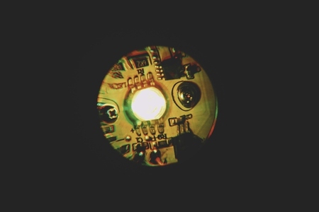Isolated on dark circuit of a colorful lamp