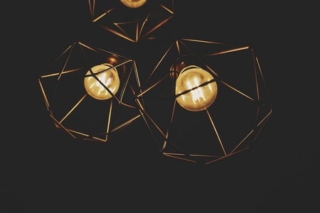 Low view of a golden geometric lamp