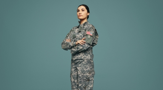 United States army soldier standing in a studio