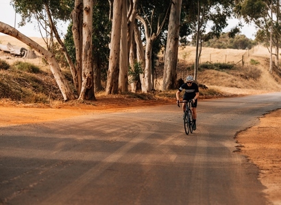 Female cyclist on her bicycle during training outdoors