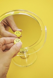 Conceptual image of happiness and wellness in yellow color
