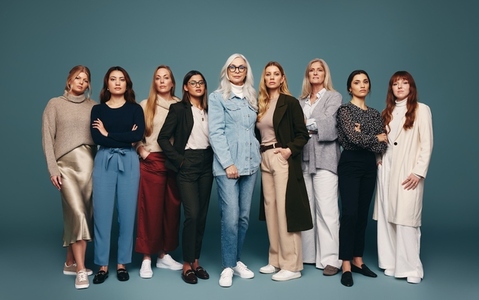 Self confident women standing together in a studio