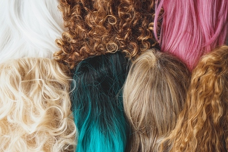 Image of assorted kind of color and styles wigs