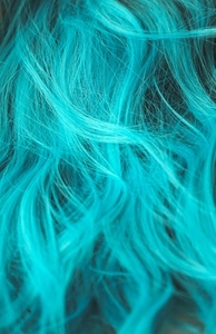 Texture image of a turquoise wig