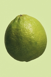 Close up vibrant whole green lime