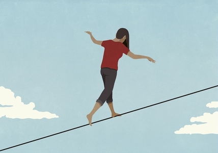 Barefoot woman walking along tightrope in sky