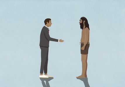 Businessman extending handshake to caveman
