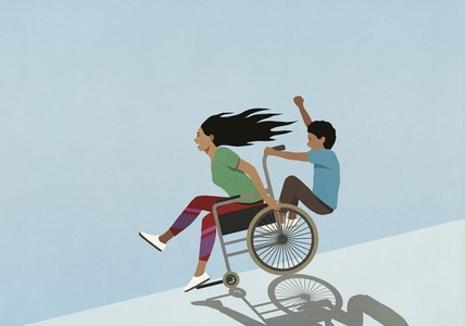 Carefree mother and son speeding downhill in wheelchair
