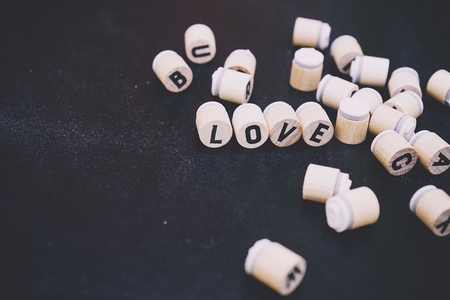 Love word doing with letter wooden stamp