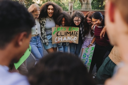 Diverse young people demonstrating against climate change