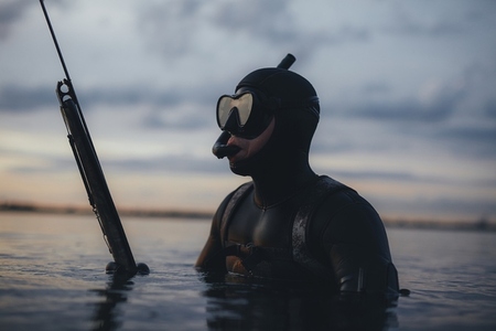 Man spearfishing with a speargun