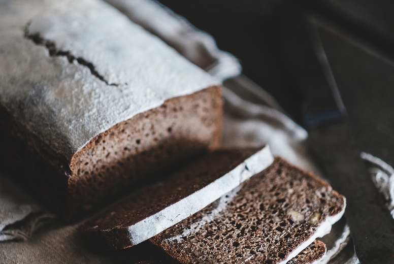 Healthy rye Swedish bread cut in slices over kitchen counter