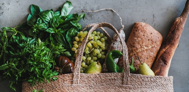 Flat lay of healthy shopping bag with fresh produce  wide composition