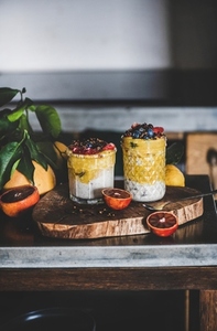 Muesli with mango smoothie  buckwheat granola and fresh berries