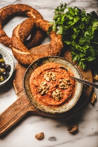 Turkish smoked red pepper paste with walnuts  simit bagels  parsley