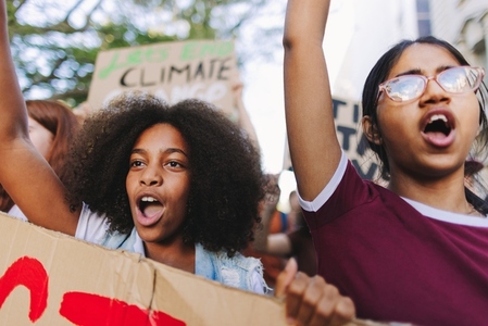Vibrant teenagers marching against climate change
