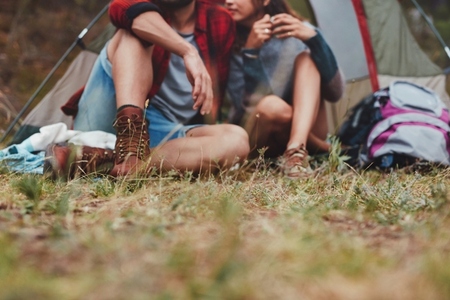 Romantic couple camping outdoors