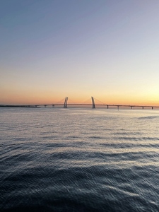 View on a big bridge at sunset on a sea