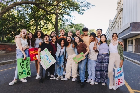 Multiethnic young people holding a climate protest