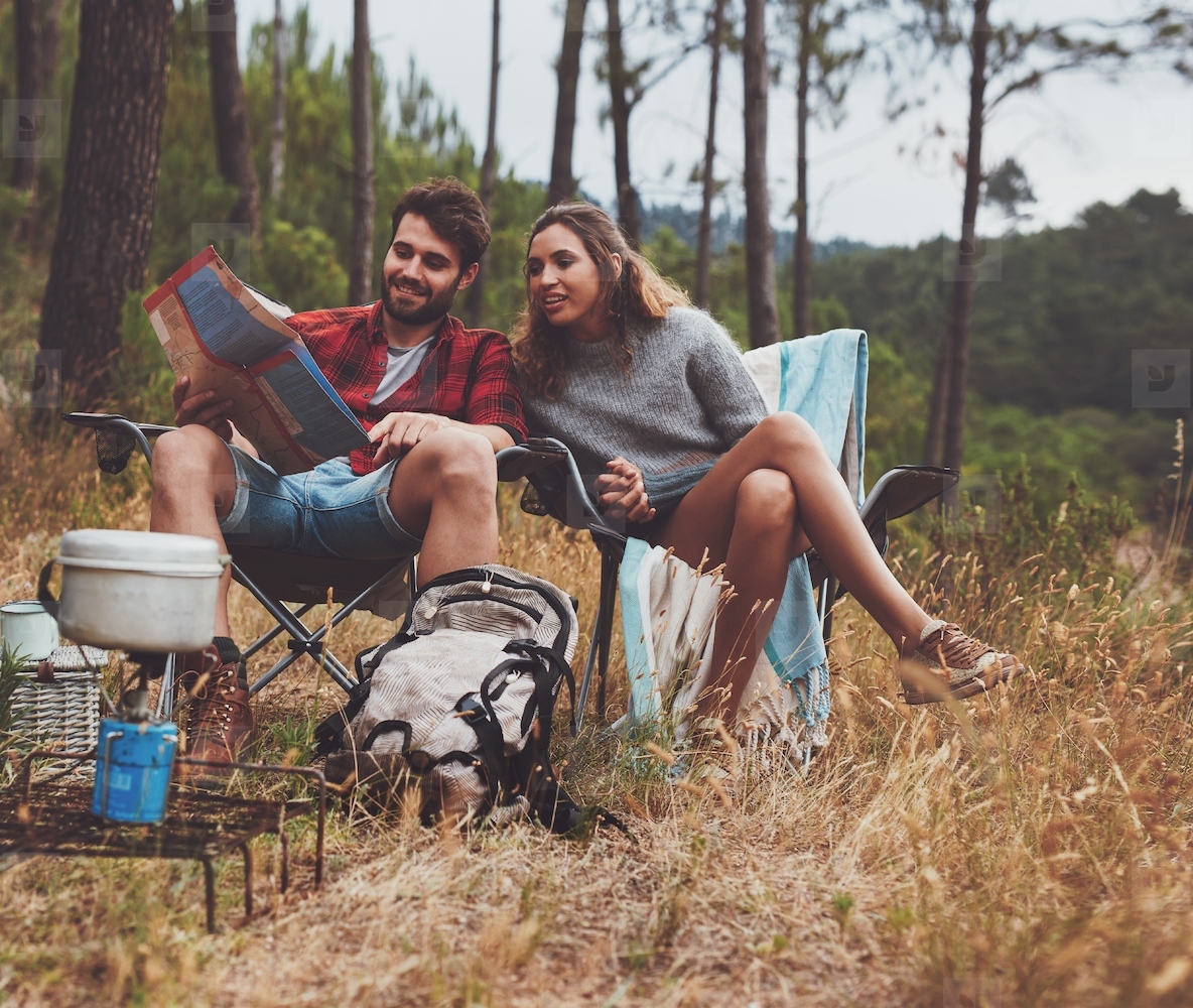 Young campers looking at a map