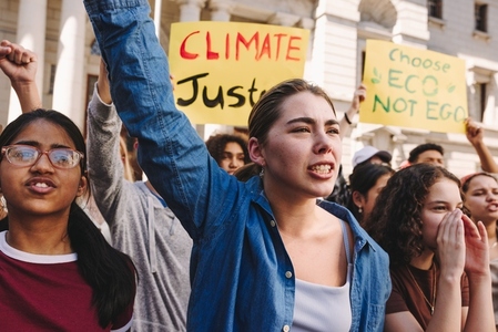 Diverse young people fighting for climate justice in the city
