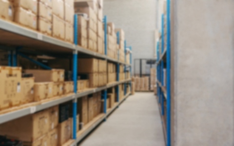Blurred background of a fulfillment warehouse