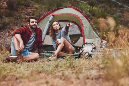 Young couple camping in nature