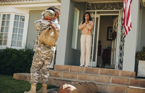 Military man surprising his family with his return