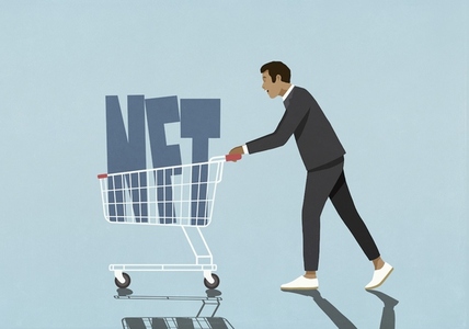 Businessman investor pushing NFT text in shopping cart