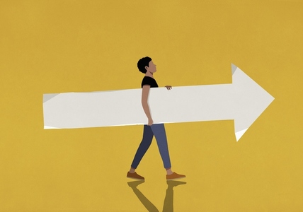 Man carrying paper arrow on yellow background