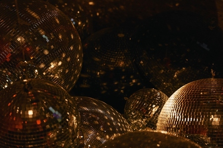 Close up sparkly gold disco balls