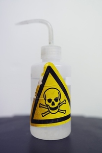 Close up biohazard label on bottle
