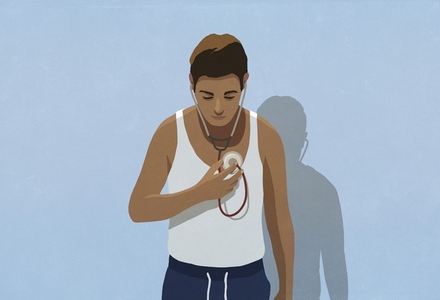 Man with stethoscope checking his own breathing